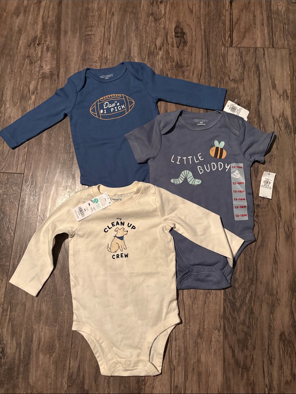 Bundle of three baby onesies